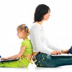 woman and child with laptop
